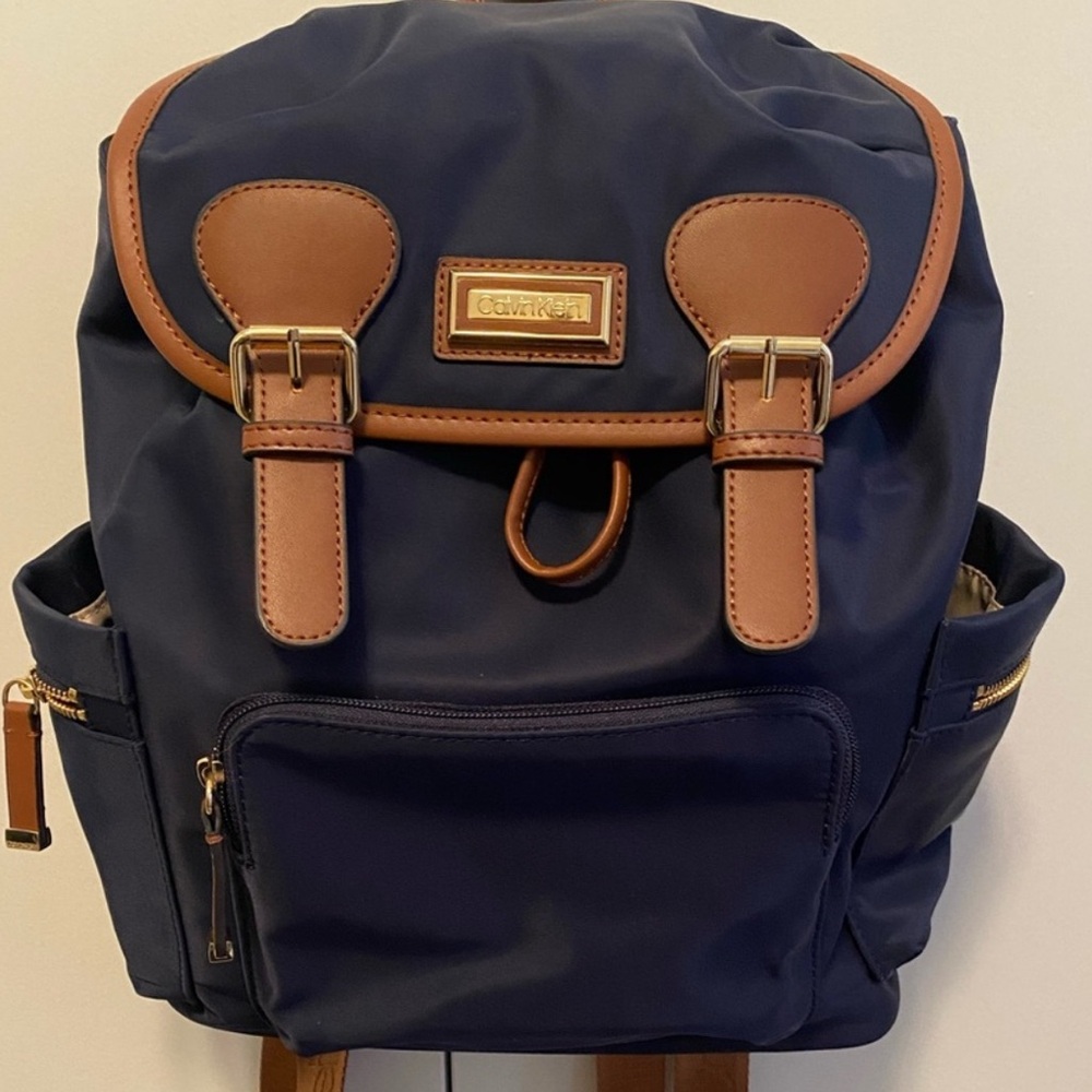 Calvin Klein Blue and Brown Backpack with Durable Fabric and Classic Design